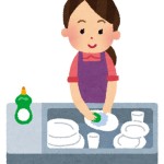 洗い物をしている若い女性