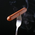 フォークに刺さっているウィンナー