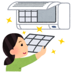 エアコンのフィルター掃除を行っている女性