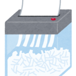 紙を破砕いているシュレッダー